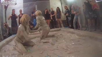 Messy Wrestling: Tattooed Beauty, Ripped Clothes & Lots Of Mud Covered Booby & Booty! Screencap 23 on www.sinx.com