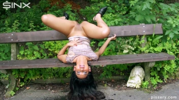 Sexy Pisser Caught Peeing In The Park Screencap 19 on www.sinx.com