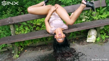 Sexy Pisser Caught Peeing In The Park Screencap 12 on www.sinx.com