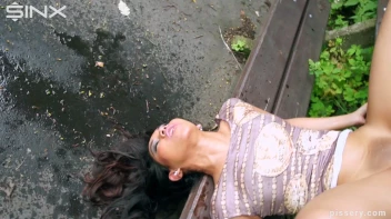 Sexy Pisser Caught Peeing In The Park Screencap 16 on www.sinx.com