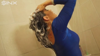 Fully Clothed Brunette Lathers Up In The Shower Screencap 14 on www.sinx.com