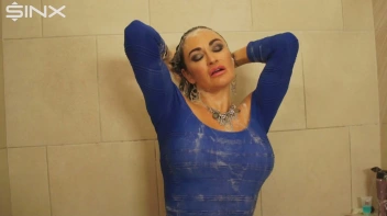 Fully Clothed Brunette Lathers Up In The Shower Screencap 42 on www.sinx.com