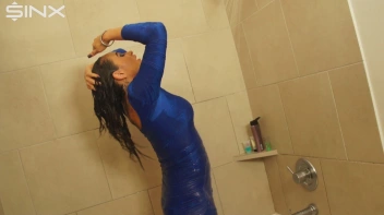 Fully Clothed Brunette Lathers Up In The Shower Screencap 10 on www.sinx.com