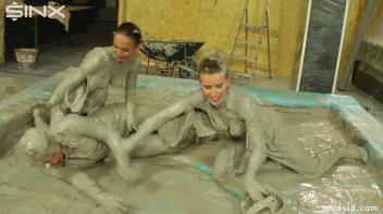 Messy girls double team hot blonde in mud wrestling catfight Screencap 18 on www.sinx.com