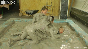 Messy girls double team hot blonde in mud wrestling catfight Screencap 23 on www.sinx.com