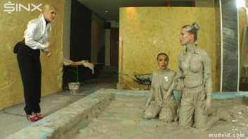 Messy girls double team hot blonde in mud wrestling catfight Screencap 1 on www.sinx.com