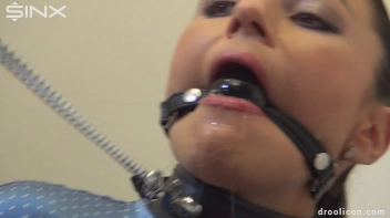 Leashed Brunette Drools While Humiliated With Ball Gag Screencap 28 on www.sinx.com