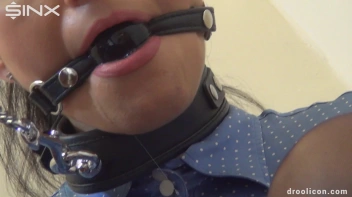 Leashed Brunette Drools While Humiliated With Ball Gag Screencap 6 on www.sinx.com