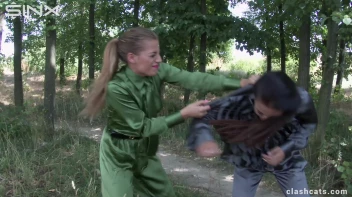 Feisty Twins Catfight In The Woods Screencap 11 on www.sinx.com