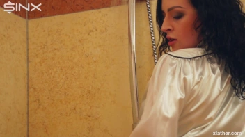 Clothed Beauty Showering In Satin Blouse Screencap 2 on www.sinx.com