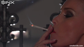 Blonde Tease Coyly Smoking Screencap 30 on www.sinx.com