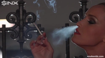 Blonde Tease Coyly Smoking Screencap 33 on www.sinx.com