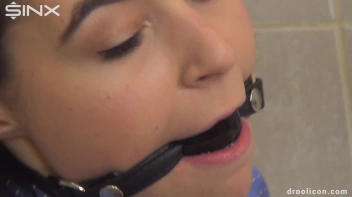 Ballgagged BDSM Babe Drools All Down Her Clothing Screencap 4 on www.sinx.com