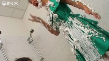 Two Messy Babes Covered In Foam Screencap 18 on www.sinx.com