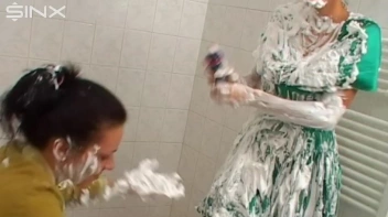 Two Messy Babes Covered In Foam Screencap 25 on www.sinx.com