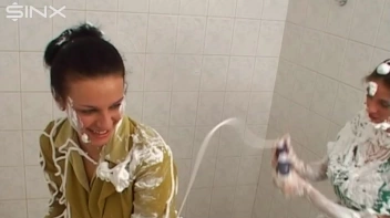 Two Messy Babes Covered In Foam Screencap 26 on www.sinx.com