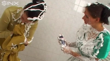 Two Messy Babes Covered In Foam Screencap 32 on www.sinx.com