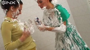 Two Messy Babes Covered In Foam Screencap 34 on www.sinx.com