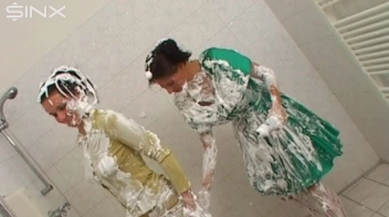 Two Messy Babes Covered In Foam Screencap 37 on www.sinx.com
