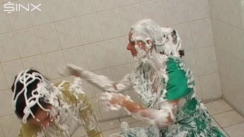 Two Messy Babes Covered In Foam Screencap 48 on www.sinx.com
