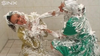 Two Messy Babes Covered In Foam Screencap 50 on www.sinx.com