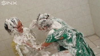 Two Messy Babes Covered In Foam Screencap 60 on www.sinx.com