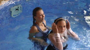 Twins Enjoy A Fully Clothed Splash In The Pool Screencap 31 on www.sinx.com