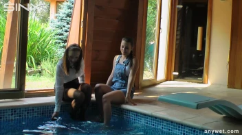 Twins Enjoy A Fully Clothed Splash In The Pool Screencap 6 on www.sinx.com