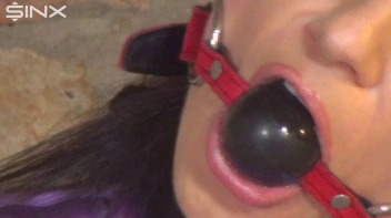 Handcuffed Hottie Drools Down Her Satin Blouse Screencap 2 on www.sinx.com